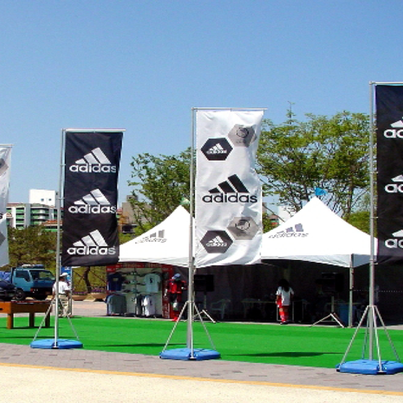 Outdoor flags with weighted bases for Adidas
