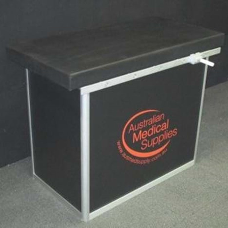 Aluminium frame table with padded cushion and sliding handle
