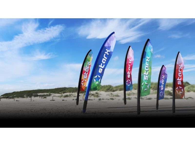 Custom extra large flags on the beach